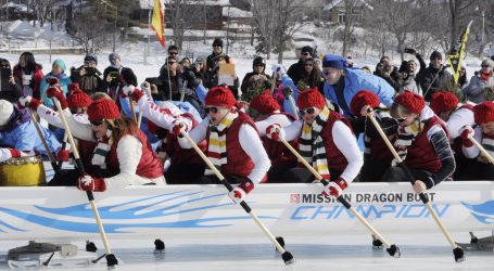 Ice Dragon Boat racers slide for fun, charity