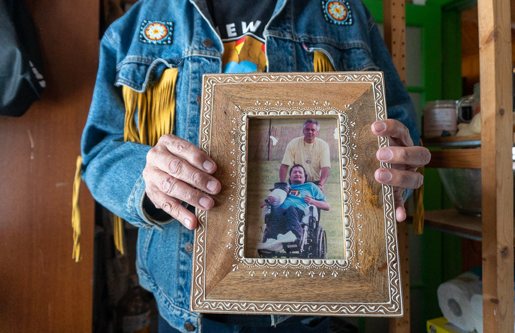 Albert holding picture frame