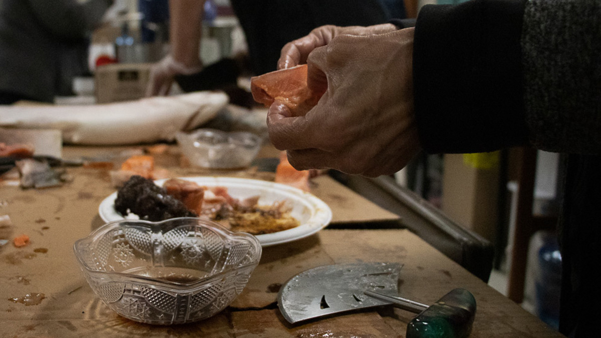 NEW Photo 8_edit A woman rips an Arctic char