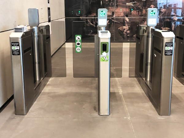 An entrance post is shown here. Its large width is its notable feature, allowing people using mobility aids, strollers, or bikes to get through easily.
