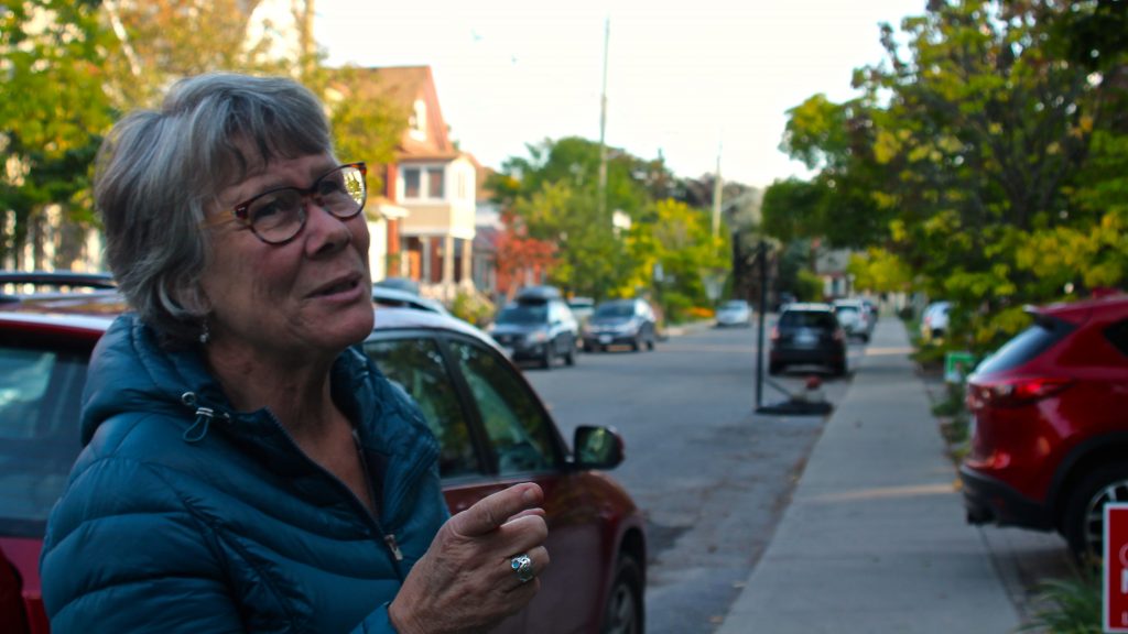 Co-founder Suzzane Gognan showcasing the cohousing homes from the outside