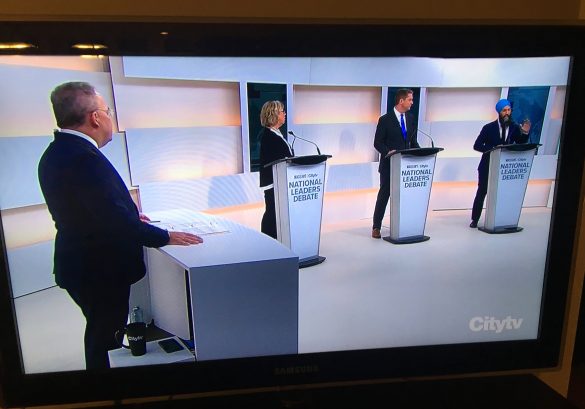 The Green, Conservative and NDP leaders participate in the first debate of the 2019 election campaign