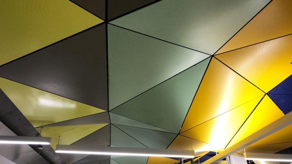 The ceiling of Parliament station is meant to display a sunset with its triangular geometric pattern.