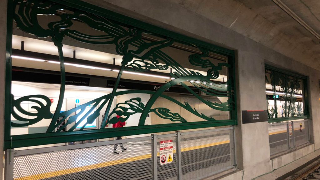 The metal frames dividing the tracks represent nature in the midst of concrete from coast to coast to coast. 