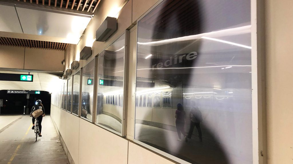 Michael Besant's Train of Thought features black and white portraits along the walls, which are designed to follow you through the tunnel at uOttawa station.