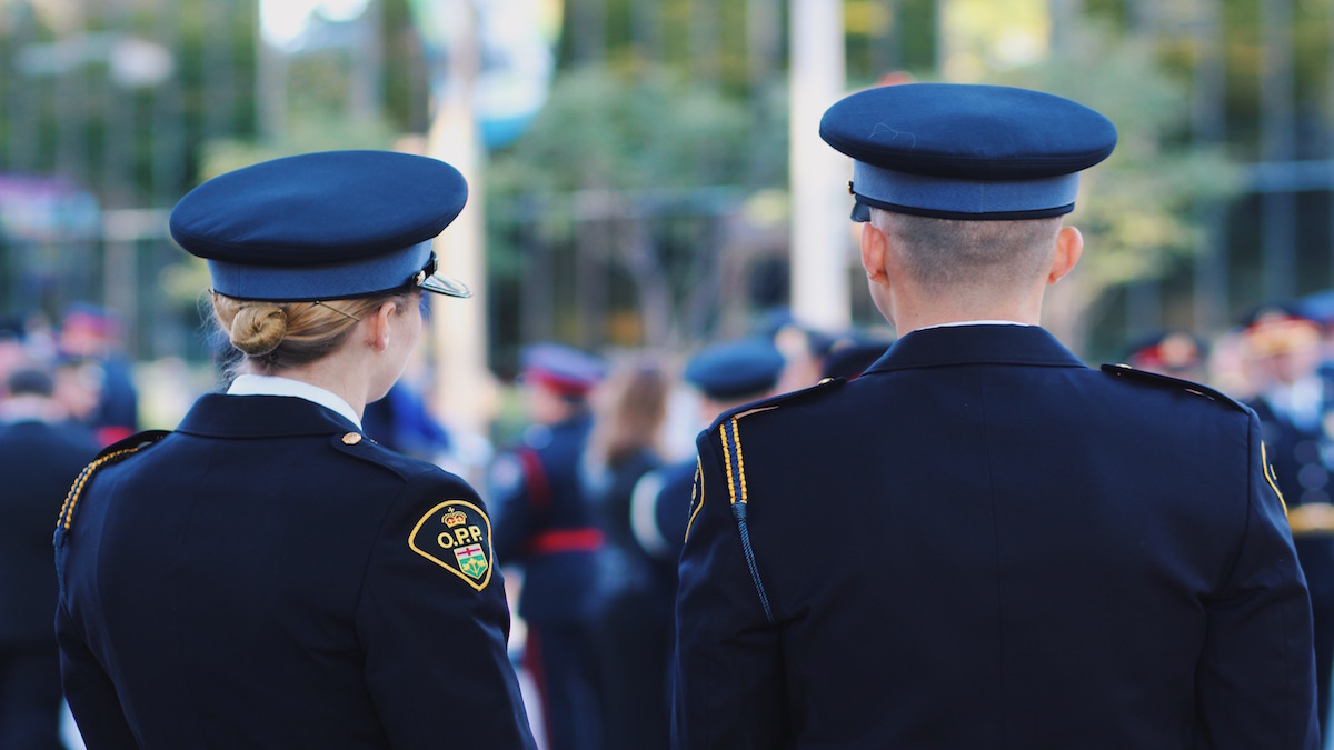 The backs of two OPP officers