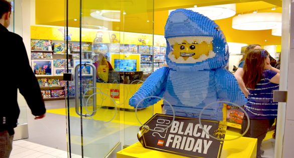 A shopper entering the LEGO store on Black Friday.