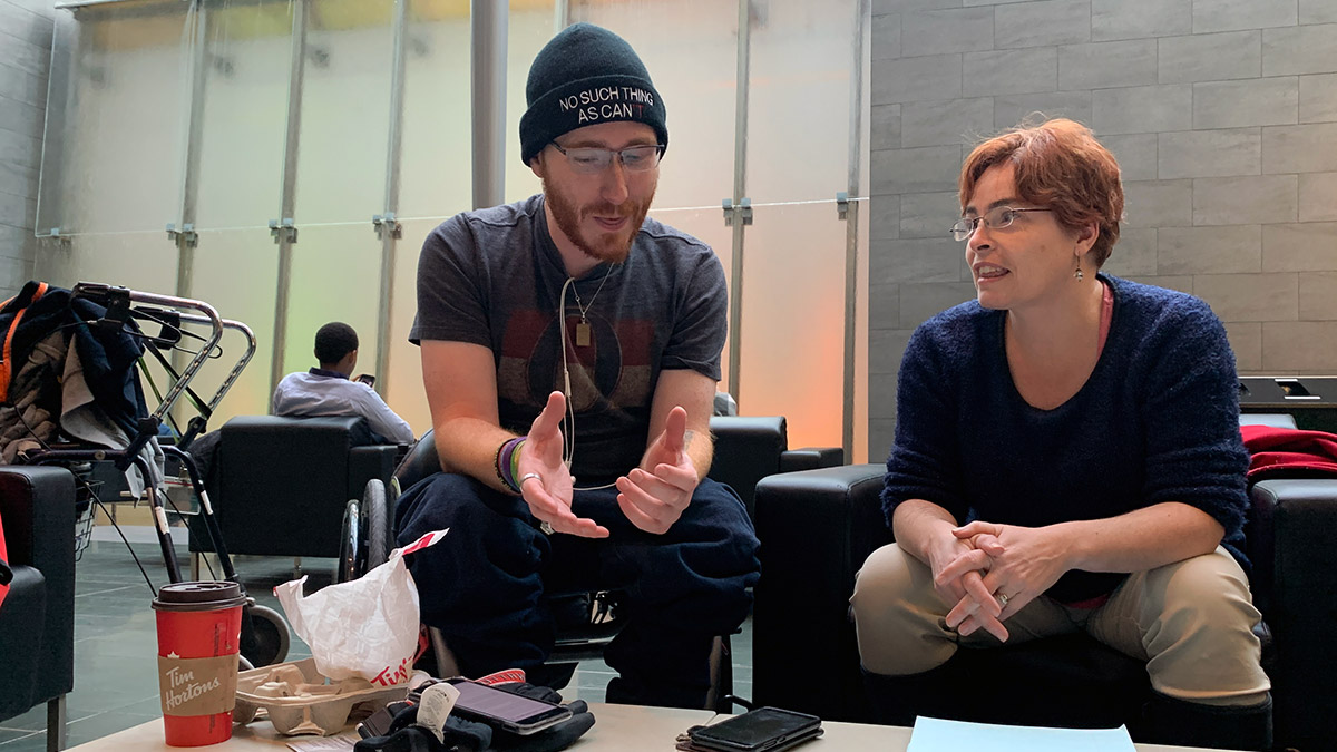 Kyle Humphrey and Kari Glynes Elliott sit down for a meeting in downtown Ottawa.