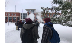 Two students from Sacred Heart Catholic High School, ages 15 and 16, vaping in front of the school.