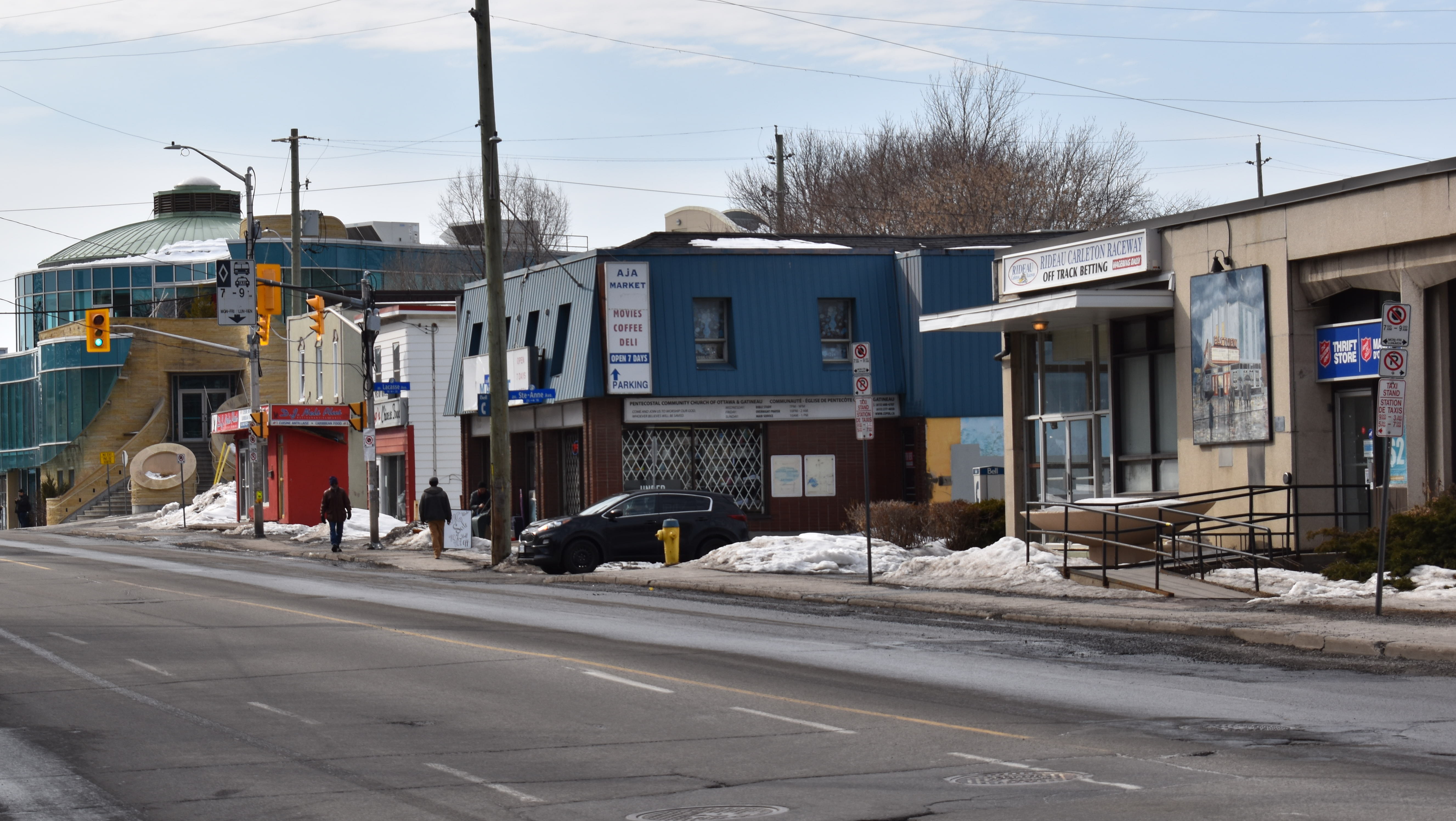 A view of Montreal Road from the right side, showing the Ottawa Bazaar and Salvation Army building on the left. 
