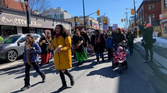 A crowd of people march in the Ottawa Women's March