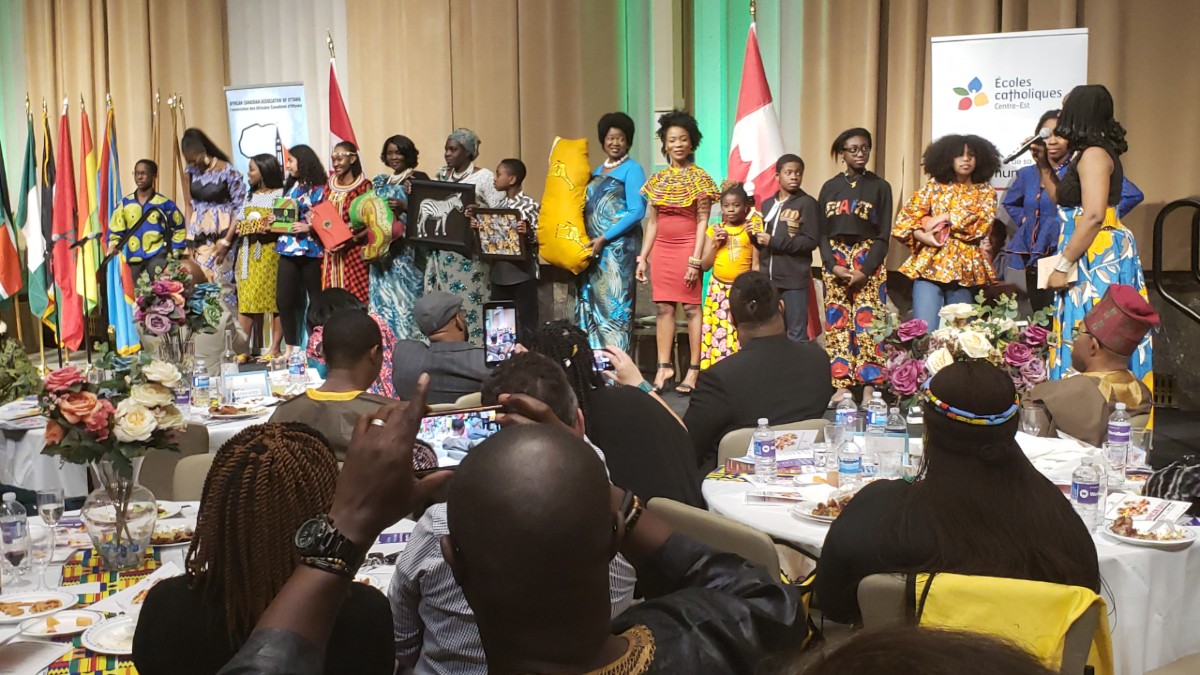 People on stage at an ACAO event.