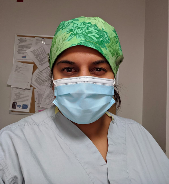 Hanmiah puts on a mask as soon as she enters the hospital and wears it for the duration of her shift.