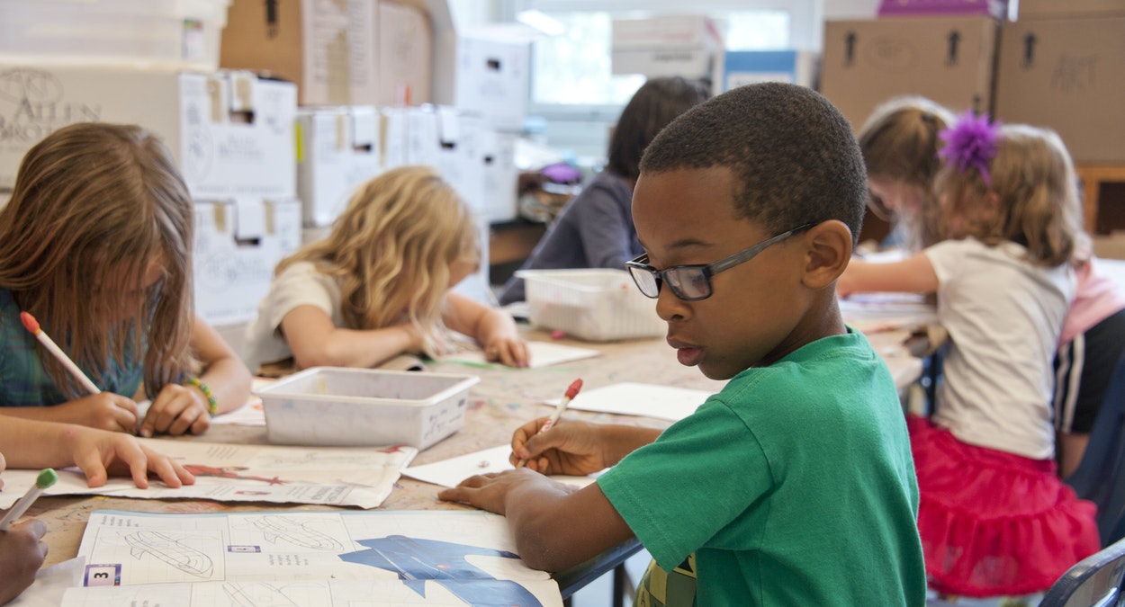 Children working in a classroom.