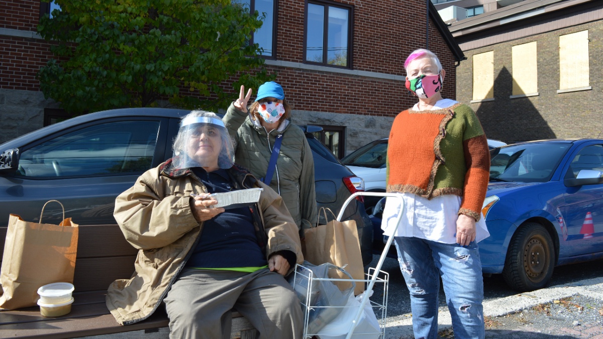 On Friday, Oct. 9, Parkdale Food Centre handed out 200 Thanksgiving meals. From left to right: Mary Hill, Ashley-Lynn Foster and Karen Secord. [Photo © Christianna Alexiou]