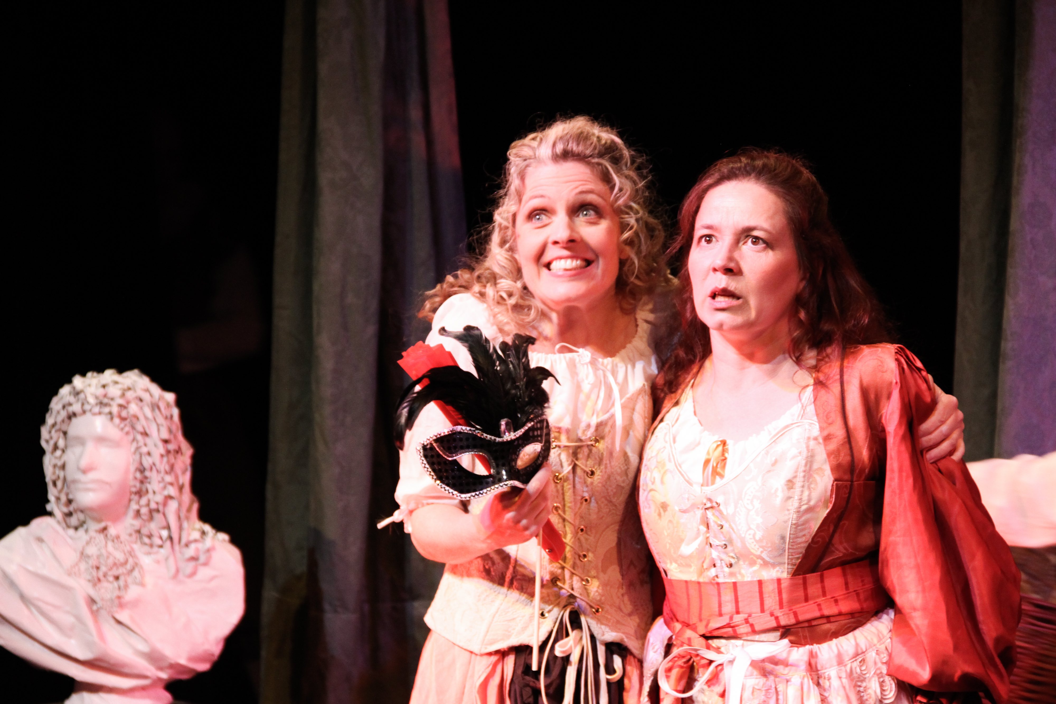 Photo of two actresses, Shawna Pasini on the left and Robin Guy on the right, during a show