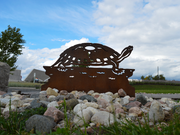 A statue of a turtle in Pindigen Park. A park in Ottawa that highlights Indigenous culture and heritage. [Photo © Christianna Alexiou]