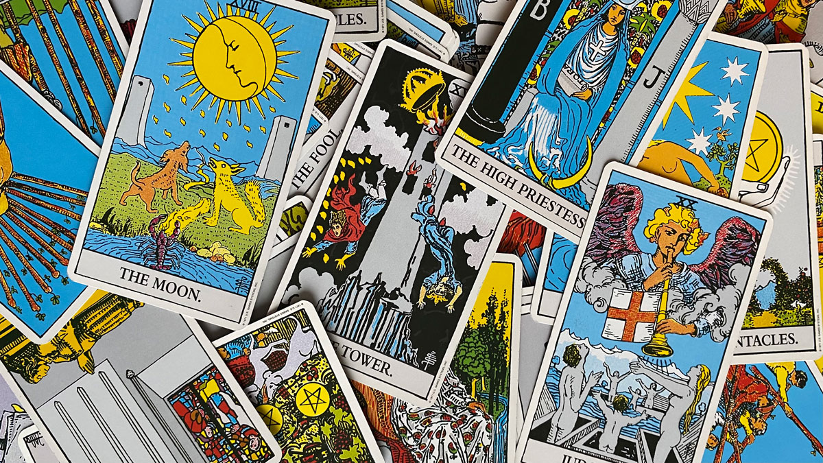 an array of tarot cards including: the moon, the tower, the high priestess. 