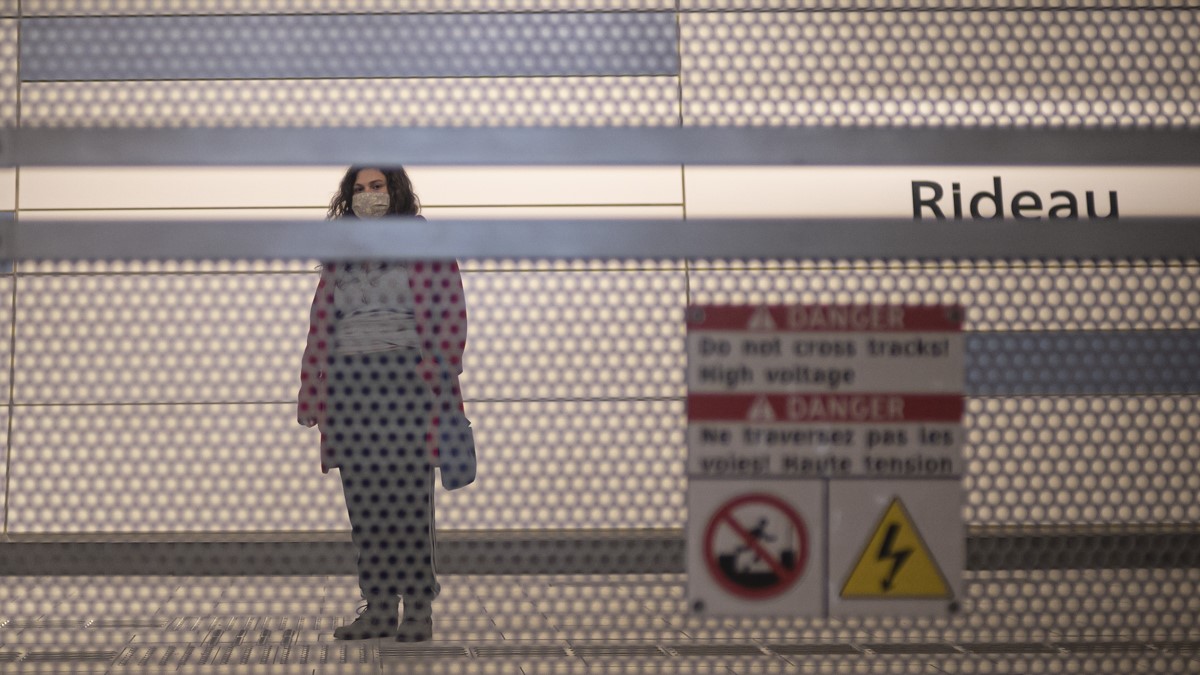 A transit riders awaits Light Rail Transit at Rideau Station