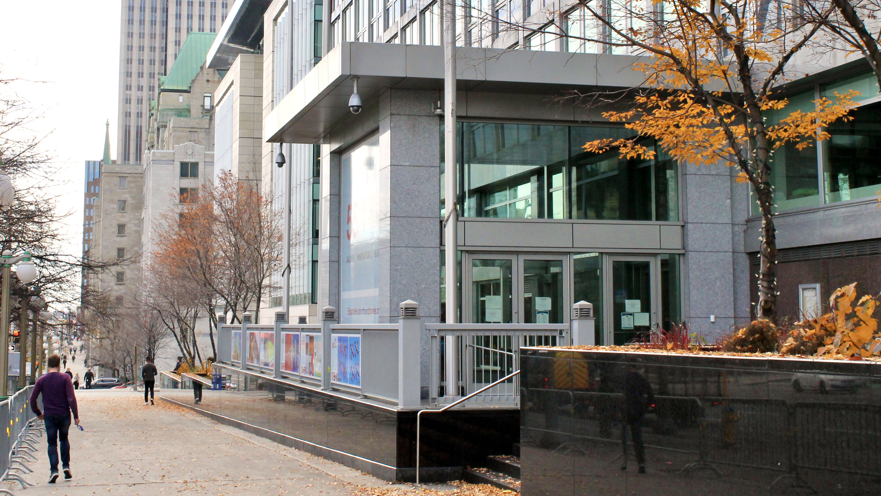 A man walks by the current British High Commission office in downtown Ottawa.