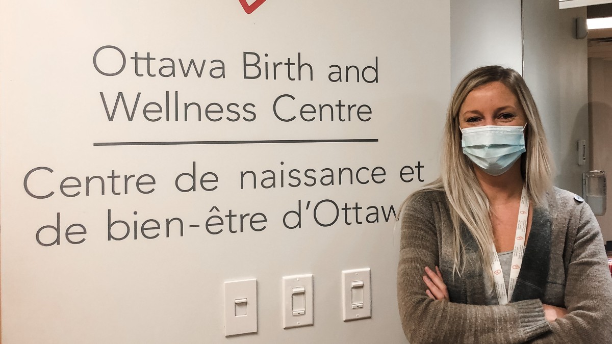 Tamara Brown, executive director of the Ottawa Birth and Wellness Centre, stands at the centre's entrance.