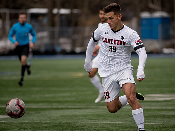 CPL draft soccer player chases ball on field