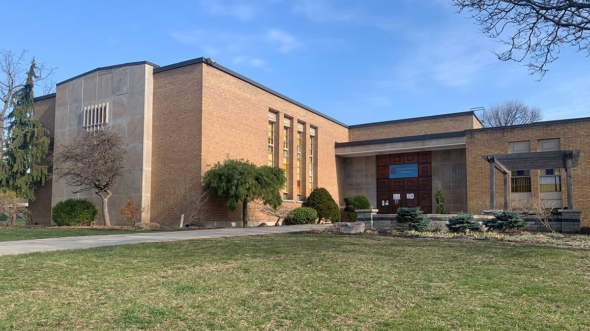 This picture shows the building of the Anshe Sholom synagogue in Hamilton, on a spring morning with a clear blue sky.