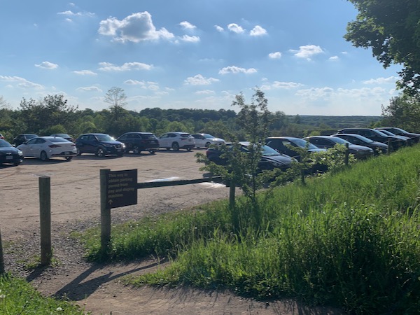 A parking lot filled with cars.