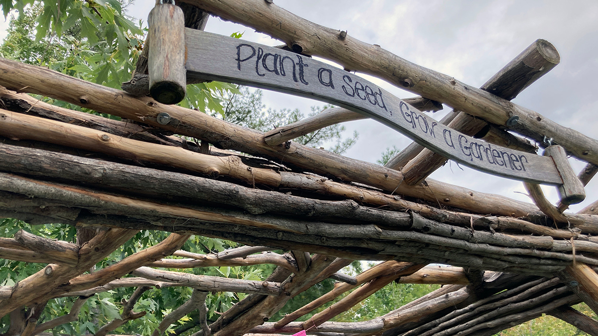 Slideshow image of a sign at the Orleans Children's Garden