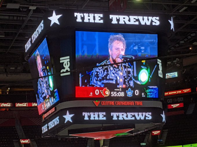 The jumbotron at the Canadian Tire Centre shows an image of the band The Trews performing before the Ottawa Senators 2021 home opener