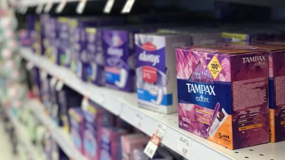 A tampon box is seen on the shelf at a Shoppers Drug Mart in Ottawa, Ont.