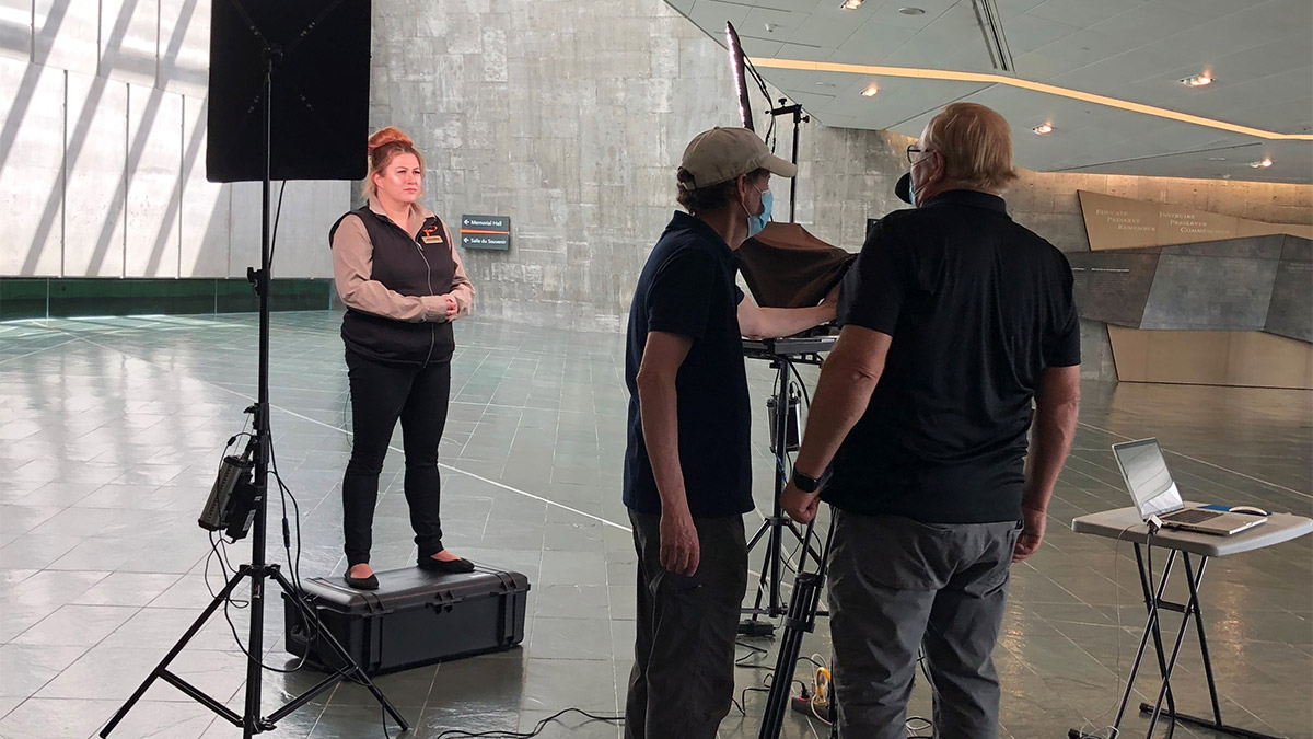 A Canadian War Museum employee is being filmed inside the museum as part of the video series for their Remembrance Day online resource.