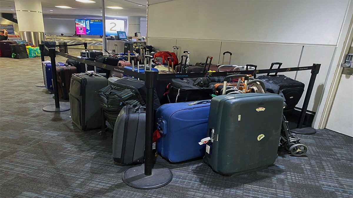 Unclaimed bags, long security lines and flight delays snarling Canada’s largest airport and raising travellers’ anger
