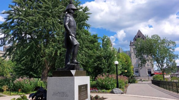 Statue of Colonel John By with the Chateau Laurier in the background
