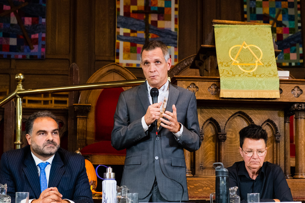 Mark Sutcliffe addresses the crowd at a mayoral debate