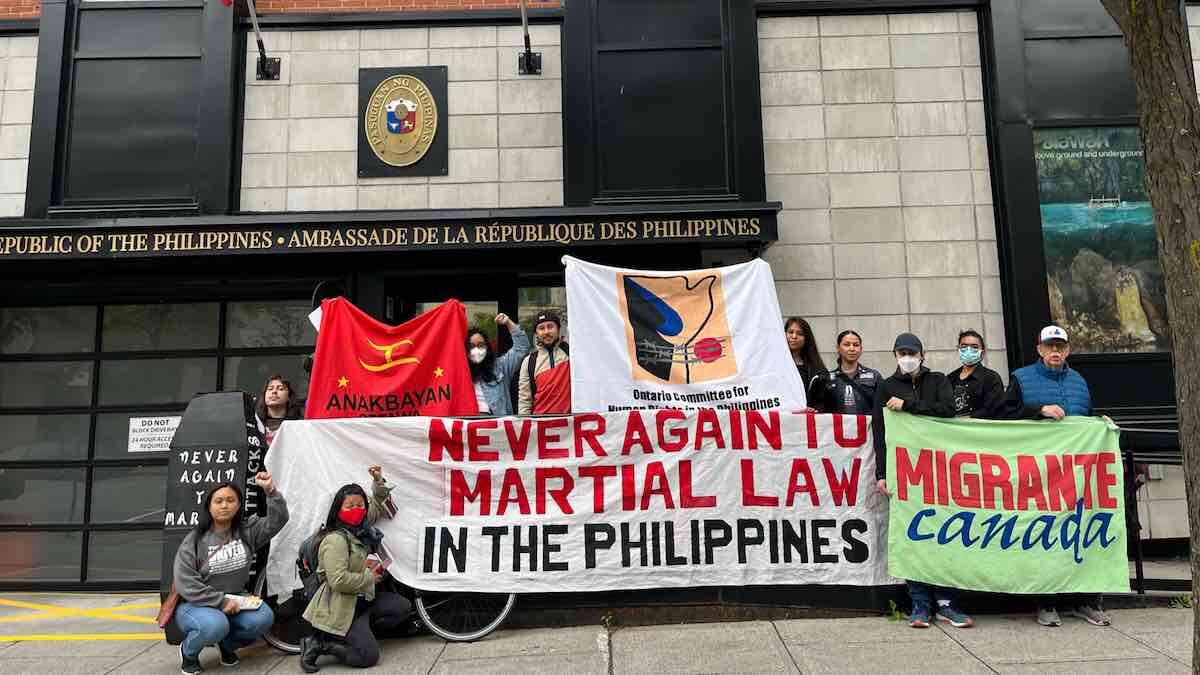 Demonstrators outside Philippines embassy protest Marcos family rule