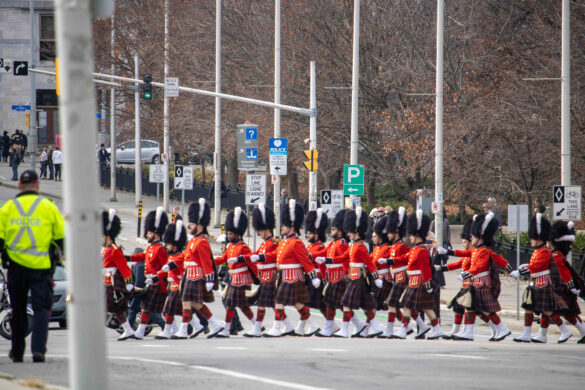 Cameron Highlanders marching across the Laurier Avenue Bridge.