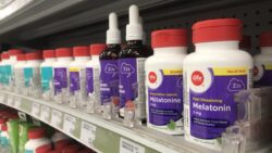 Pill bottles with purple melatonin labels line the shelves of a Shopper's Drug Mart in Ottawa, Ont.