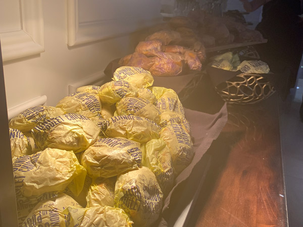 A table with McDonald's sandwiches arranged neatly.