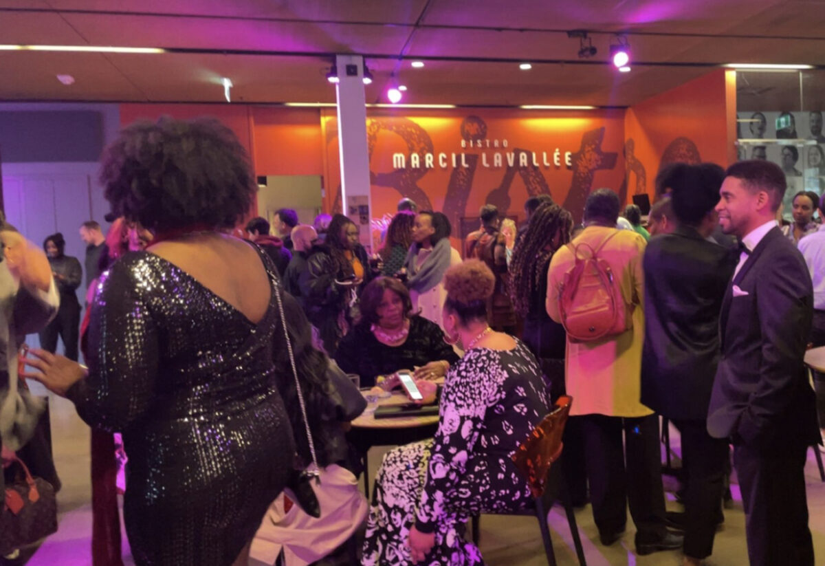 Crowd mingles at fancy gala