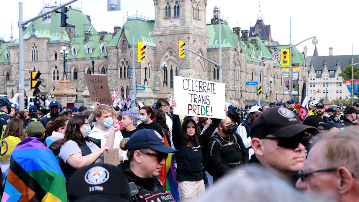 Protesters who oppose teaching gender identity in school met with counter-protesters on Parliament Hill photo