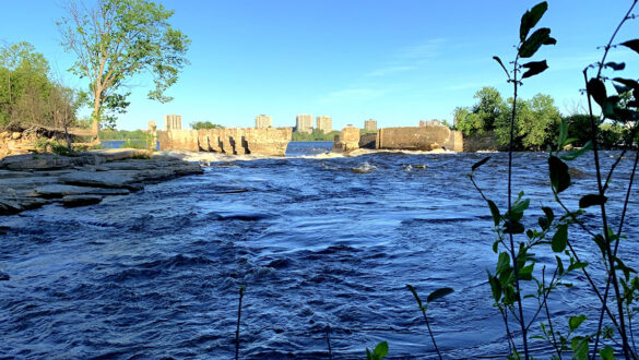The historical Aylmer Hydro Ruins jut out from the Ottawa River's Deschenes Rapids.