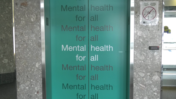 Elevator doors at the Canadian Mental Health Association's Ottawa office. On the doors is a decal that says "mental health for all."
