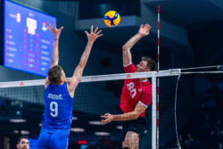 Canadian outside hitter Eric Loeppky preparing to spike the ball during the game against Serbia.