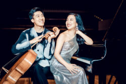 Bryan and Silvie Cheng seated with their instruments, cello and piano