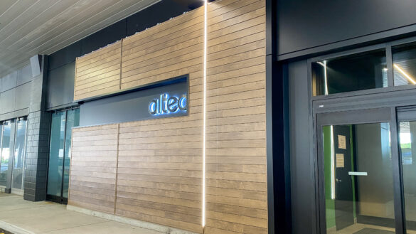 Landscape photo of brand new Altea Active fitness club front doors.