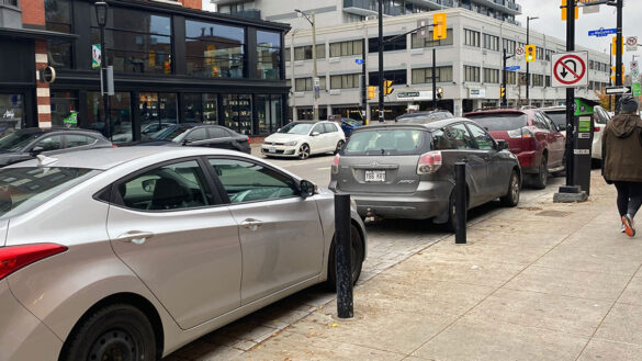 cars parked bumper to bumper along Elgin Street