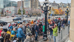 A group of protestors gathered in front of the Château Laurier to protest Ontario's Bill 212.