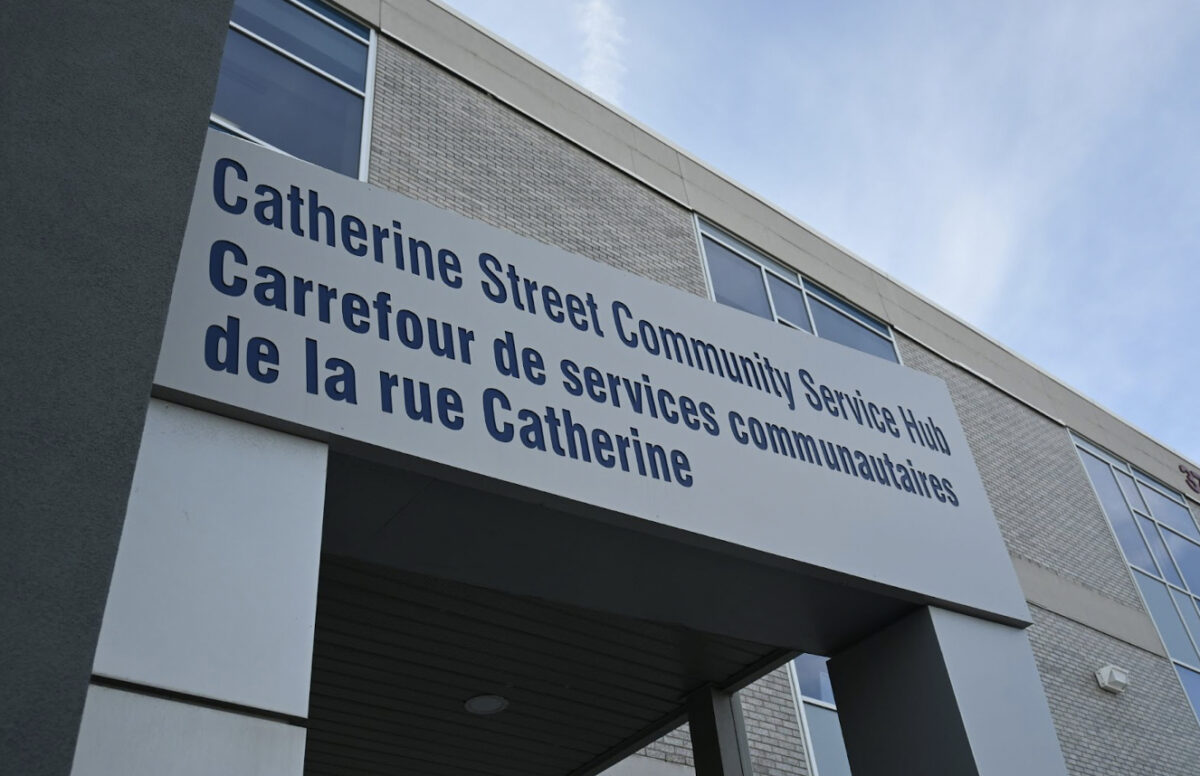 Photo shows the main sign and entrance to a health centre in downtown Ottawa.