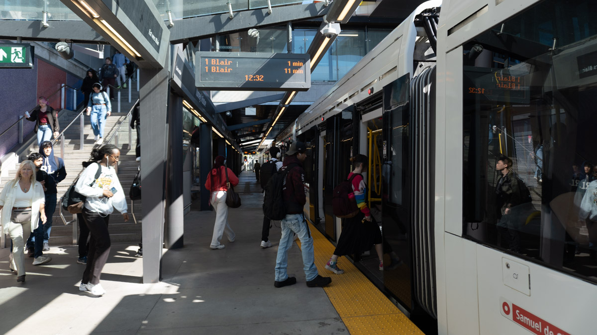 People taking the train at Tunney's Pasture station.